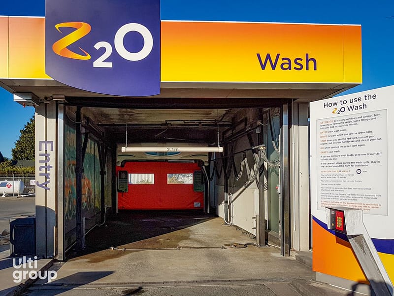 Red Ulti Roll door installed at a Z Energy car wash entry.